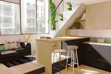 Idées déco pour une petite salle de séjour mansardée ou avec mezzanine moderne avec un mur beige, parquet clair, aucune cheminée, aucun téléviseur et un sol beige.