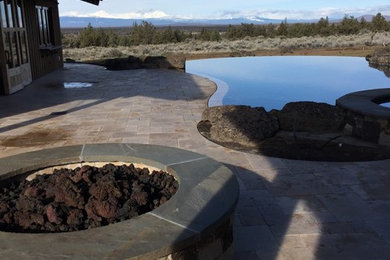 Inspiration for a rustic pool remodel in Other