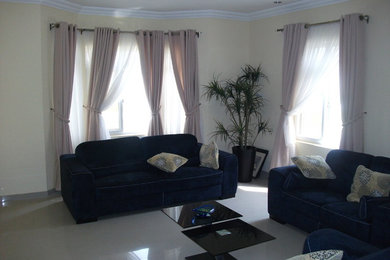 Trendy living room photo in Other