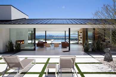 Patio - mid-century modern concrete paver patio idea in San Diego with no cover