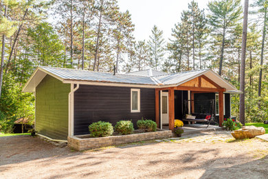 Example of an arts and crafts exterior home design in Other