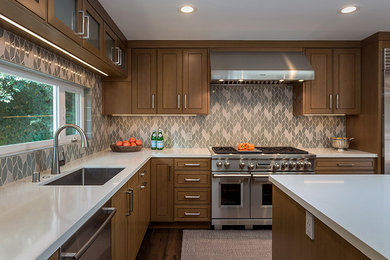 Open concept kitchen - mid-sized contemporary l-shaped dark wood floor and brown floor open concept kitchen idea in San Francisco with an integrated sink, medium tone wood cabinets, concrete countertops, multicolored backsplash, ceramic backsplash, stainless steel appliances, an island and gray countertops