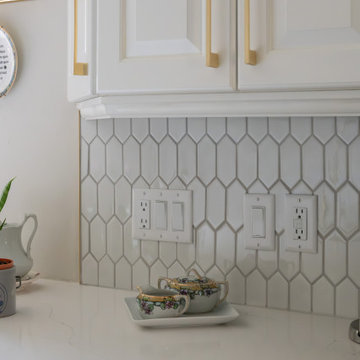 Contemporary White Kitchen Renovation with Custom Built-ins