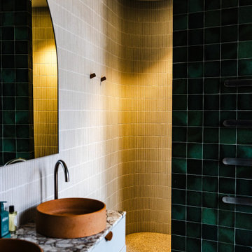 Emerald Green bathroom with custom vanities
