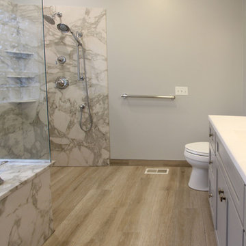 Gray Bathroom w/ White Alabaster Cultured Marble Countertops and Tyverian Shower