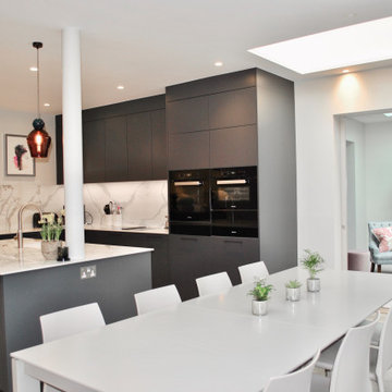 Modern and an elegant kitchen in dark grey with stunning worktop