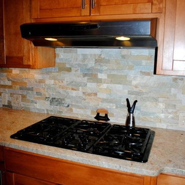 Stacked Stone Tile Backsplash and Millennium Cream Granite