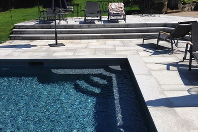 Photo of a transitional pool in New York.