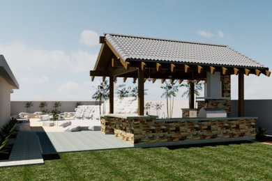 Example of a mid-sized arts and crafts backyard concrete patio kitchen design with a gazebo