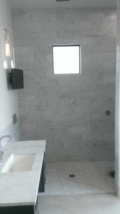 White or light gray grout for carrera marble tile floor?