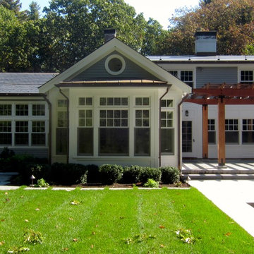 Sunroom addition and pergola