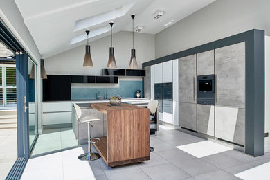 Inspiration for a large contemporary open plan kitchen in Other with with island.