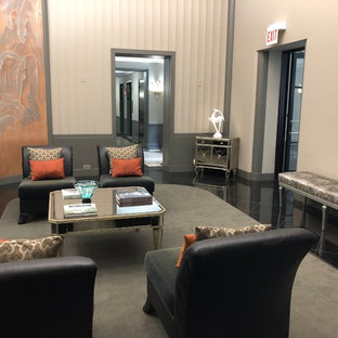 Idée de décoration pour un grand hall d'entrée bohème avec un mur gris, sol en terrazzo, une porte double, une porte en verre et un sol beige.