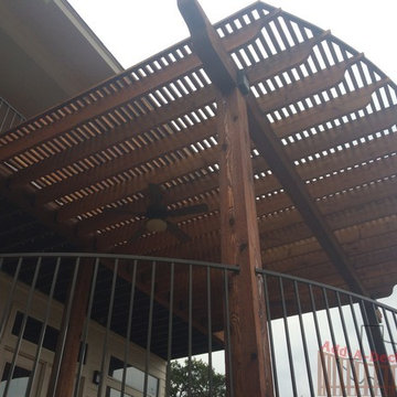 Curved Trex Tiki Torch Deck and Cedar Pergola