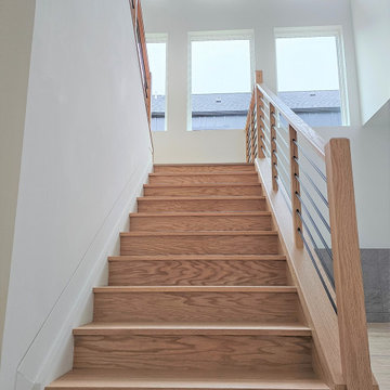 Project #108 | Red Oak Staircase in Light-Filled Space