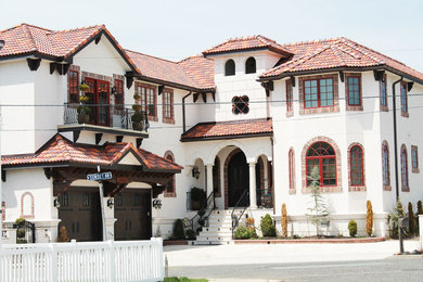 Example of a tuscan exterior home design in Philadelphia