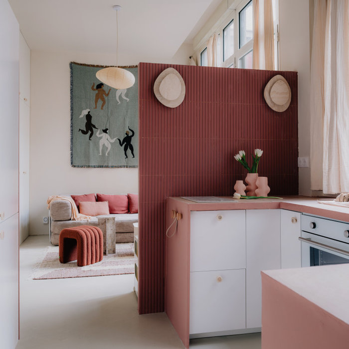 Example of a mid-century modern kitchen design in Paris