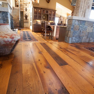 Hand Hewn Hammer Beams and Slab Siding with Oak Flooring