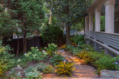 Inspiration for a mid-sized contemporary shade side yard stone garden path in DC Metro.