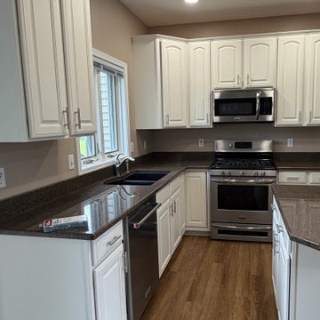 White Kitchen Cabinet Refinishing with Grain Filling – Fairport
