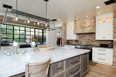 Example of a mountain style light wood floor and brown floor kitchen design in Phoenix with a farmhouse sink
