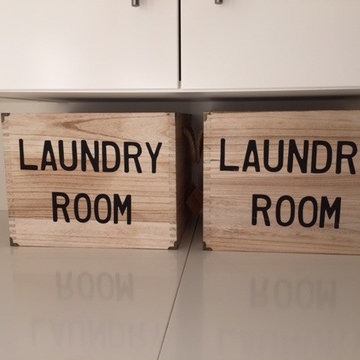 Super efficient 2 Washer and Dryer Laundry Room.