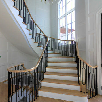 Project #95 | Freestanding Elliptical Staircase with Geometric Iron Balusters
