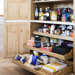 This is an example of a large traditional kitchen pantry in Other.