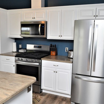 Lake Village, IN. Haas Lifestyle. Open Concept White Kitchen