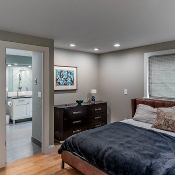 Spacious Gray Bedroom with Seating Area