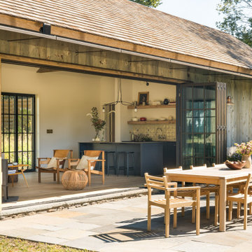 Barn-Inspired ADU & Guest Cottage in NY with NanaWall Steel Effect Doors