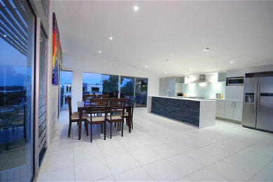 Photo of a contemporary dining room in Gold Coast - Tweed.