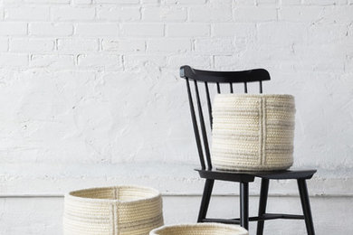 Raised line & V Cut natural wool baskets by Thayer Design Studio