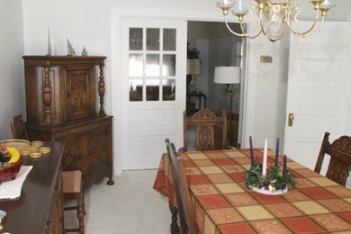 Enclosed dining room - enclosed dining room idea in Other with white walls