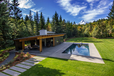 Mountain style pool photo in Portland