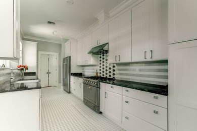 Example of a transitional kitchen design in New Orleans
