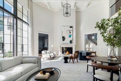 Huge transitional open concept living room photo in San Francisco with white walls and no tv