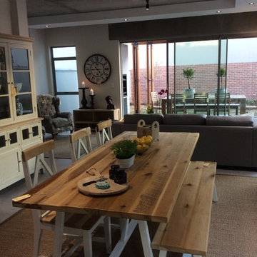 A young open plan duplex apartment needed practical furniture to suit a family