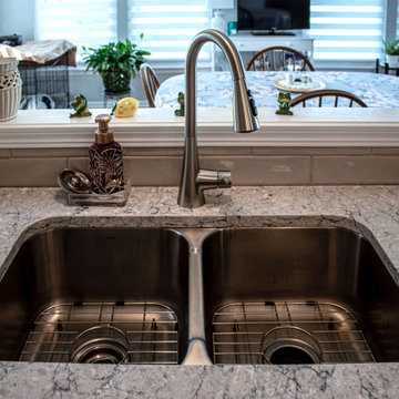 White Shaker Kitchen w/ Pietra Quartz Countertop and Gray Subway Tile Backsplash