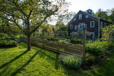 Example of a farmhouse home design design in Boston