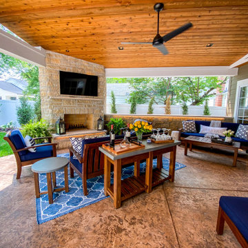 Covered Patio with a Fireplace Feature