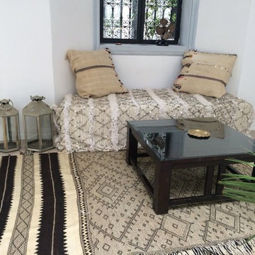 Moroccan chic interior design wedding blanket and zanafi rug