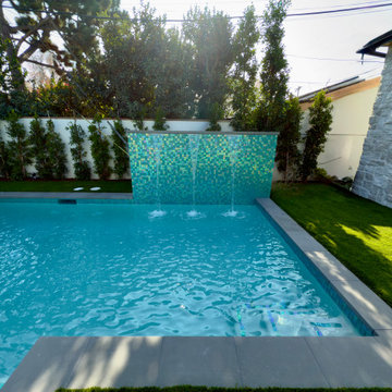 Morisson pool and spa raised wall with sheer decent