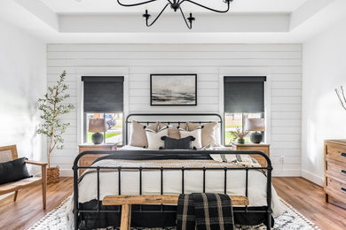 Bedroom - country guest bedroom idea in Dallas with white walls
