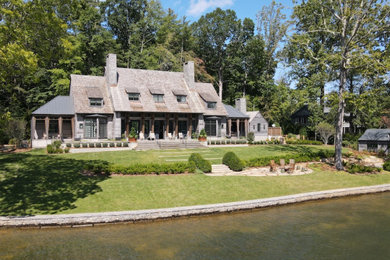 Example of a large gray two-story wood exterior home design in Atlanta with a shingle roof