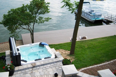 Example of an island style pool design in Other