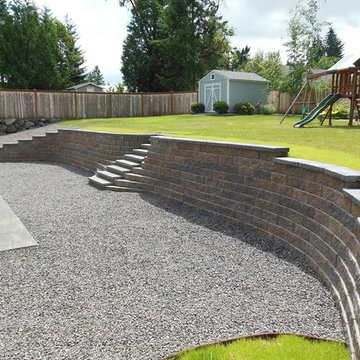 installed new blockwall and steps so the kids could get to there play area.