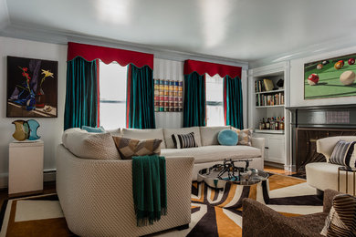 Design ideas for a transitional family room in Boston.