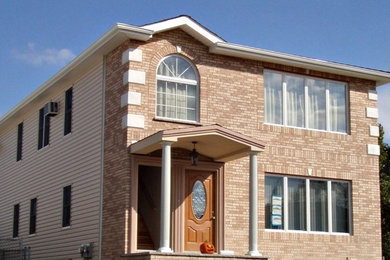 Example of a classic exterior home design in New York