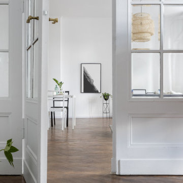 Bright Minimalist Entryway with Natural Accents in Hertford